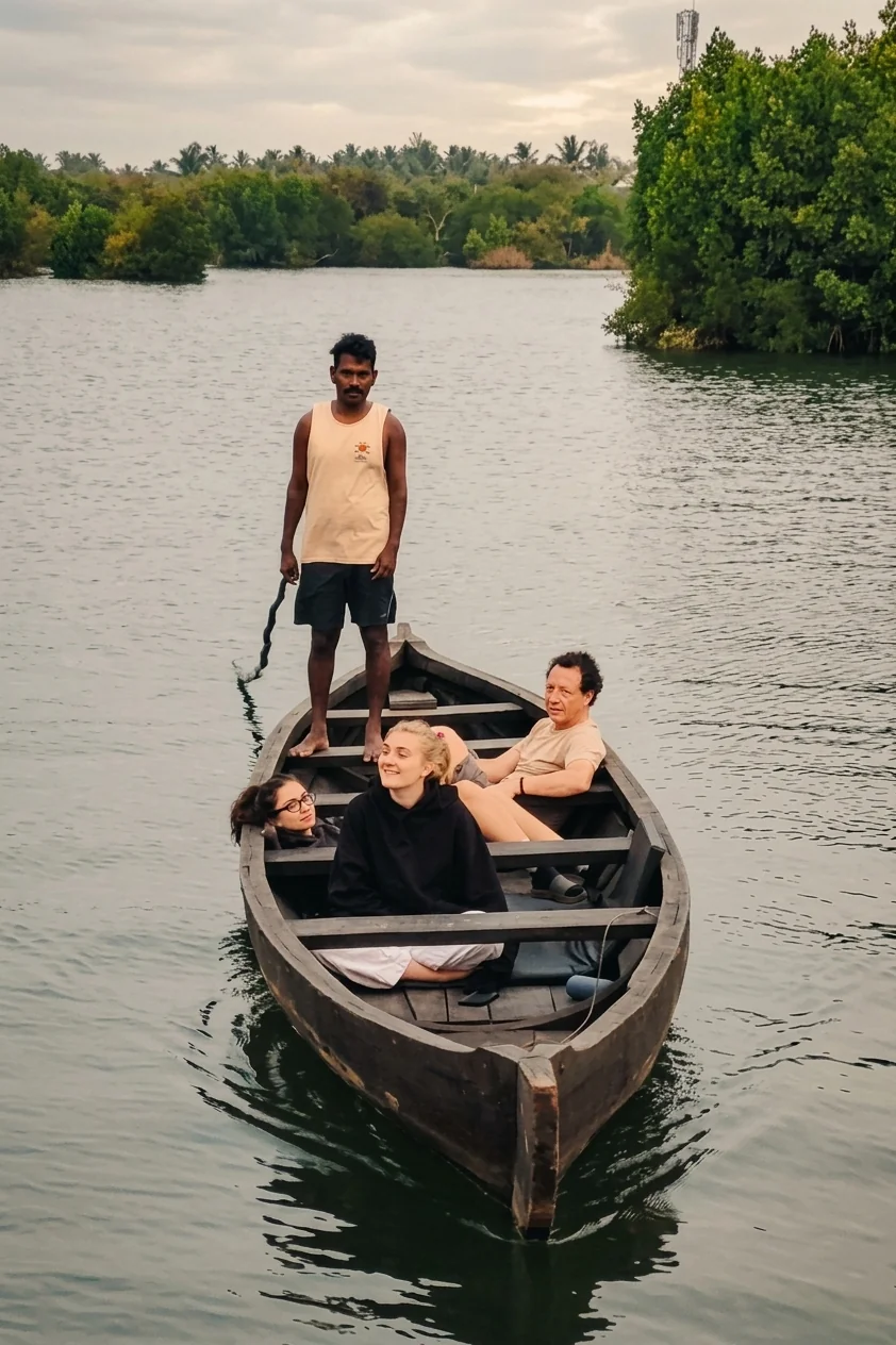 Ashtamudi backwater kayaking tour with palm trees in Kollam